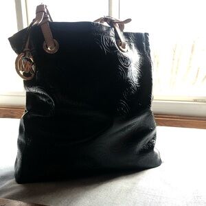 Michael Kors Black Embossed Shoulder Tote Bucket Bag w buckle straps 15x13.5x4